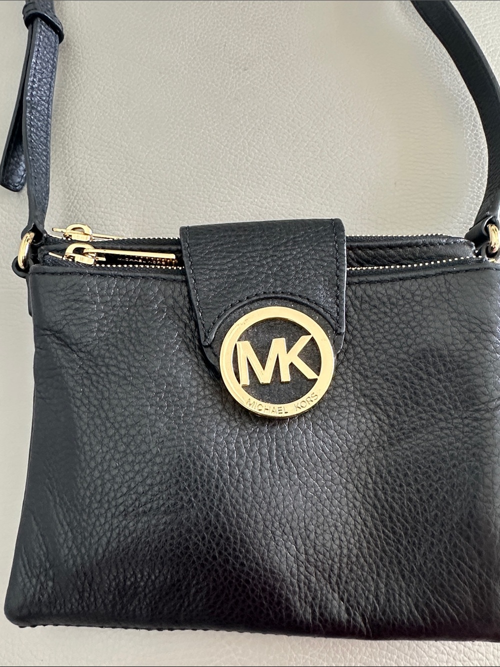 Michael Kors Black Pebbled Leather Crossbody with Gold MK Medallion